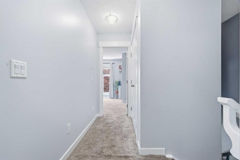 1-2432 24A Street Sw, Calgary, AB - Indoor Photo Showing Bedroom