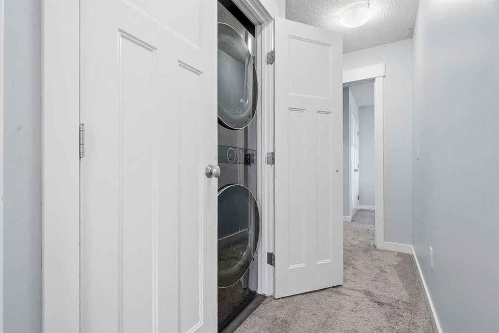 1-2432 24A Street Sw, Calgary, AB - Indoor Photo Showing Gym Room