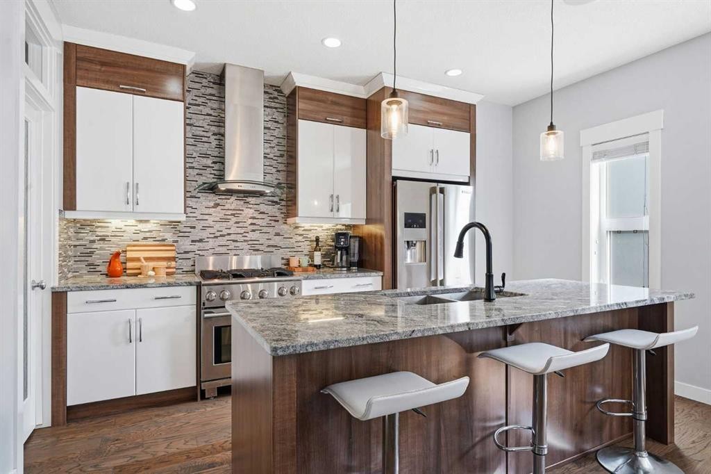 1-2432 24A Street Sw, Calgary, AB - Indoor Photo Showing Kitchen With Stainless Steel Kitchen With Double Sink With Upgraded Kitchen