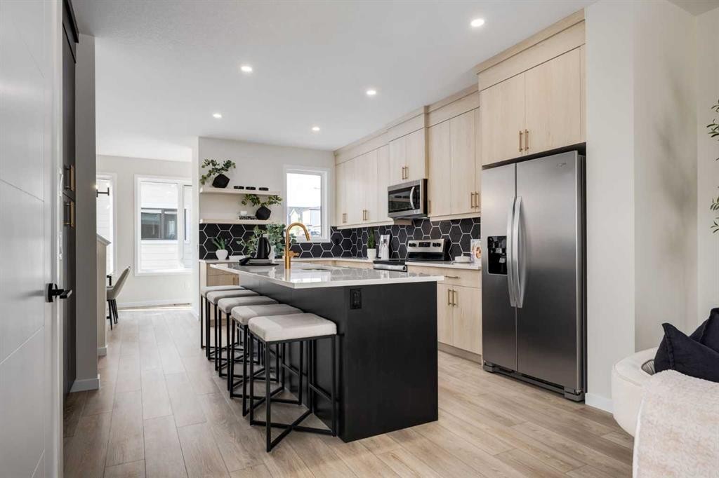 88 Bluerock Terrace Sw, Calgary, AB - Indoor Photo Showing Kitchen With Upgraded Kitchen
