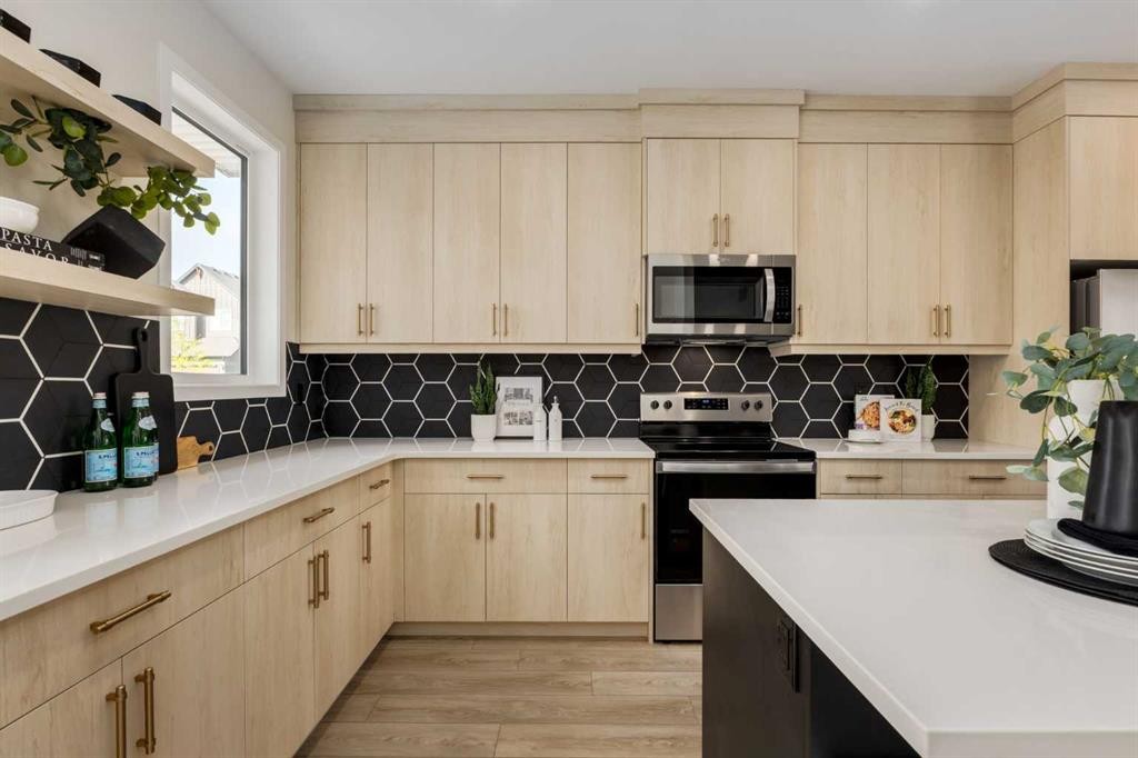 88 Bluerock Terrace Sw, Calgary, AB - Indoor Photo Showing Kitchen