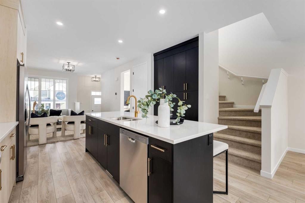 88 Bluerock Terrace Sw, Calgary, AB - Indoor Photo Showing Kitchen With Double Sink With Upgraded Kitchen