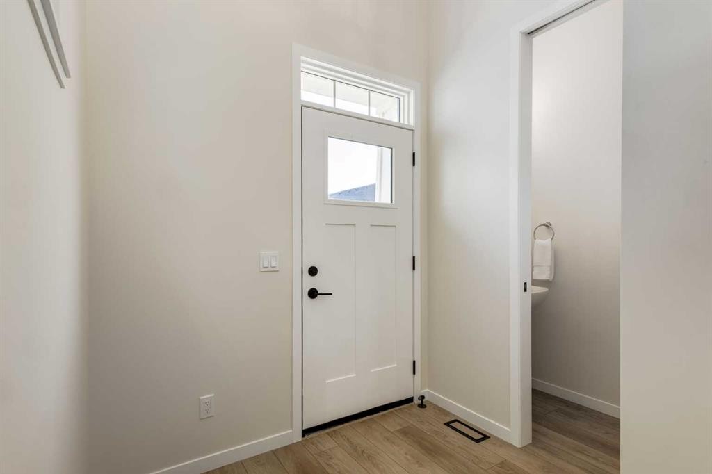 88 Bluerock Terrace Sw, Calgary, AB - Indoor Photo Showing Other Room