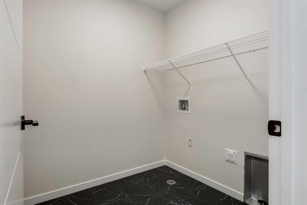 88 Bluerock Terrace Sw, Calgary, AB - Indoor With Storage