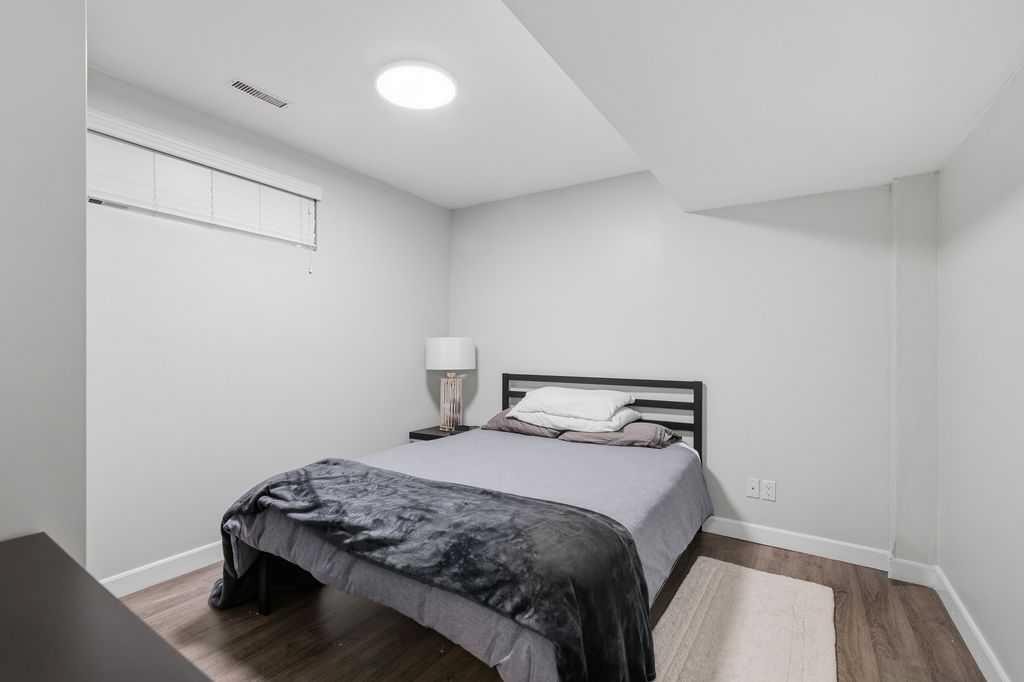 87 Couture Crescent Sw, Calgary, AB - Indoor Photo Showing Bedroom