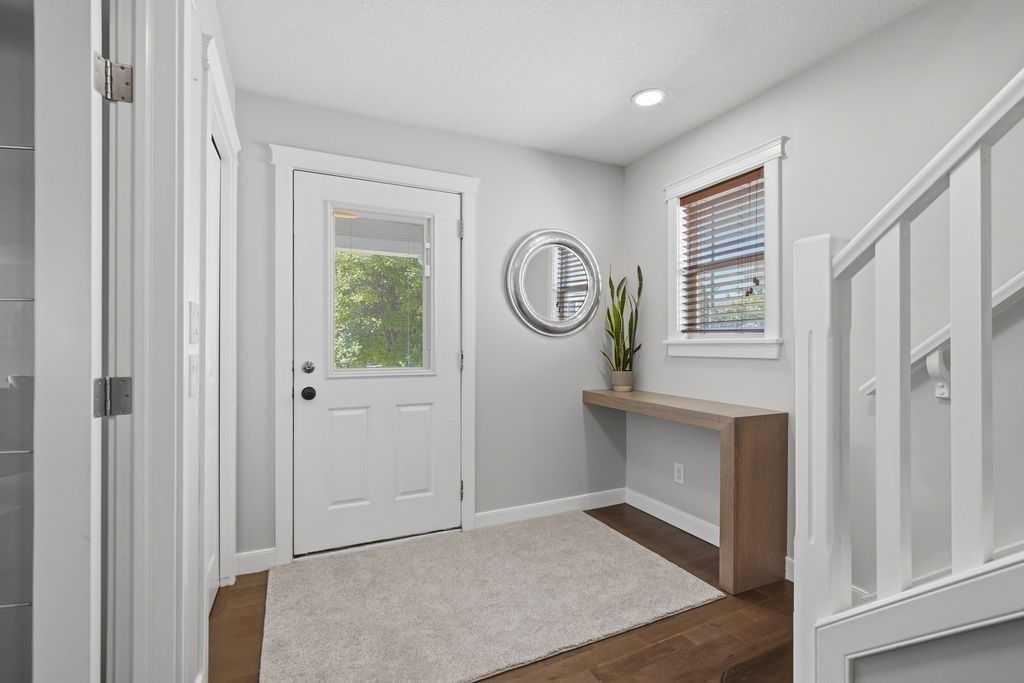 87 Couture Crescent Sw, Calgary, AB - Indoor Photo Showing Other Room