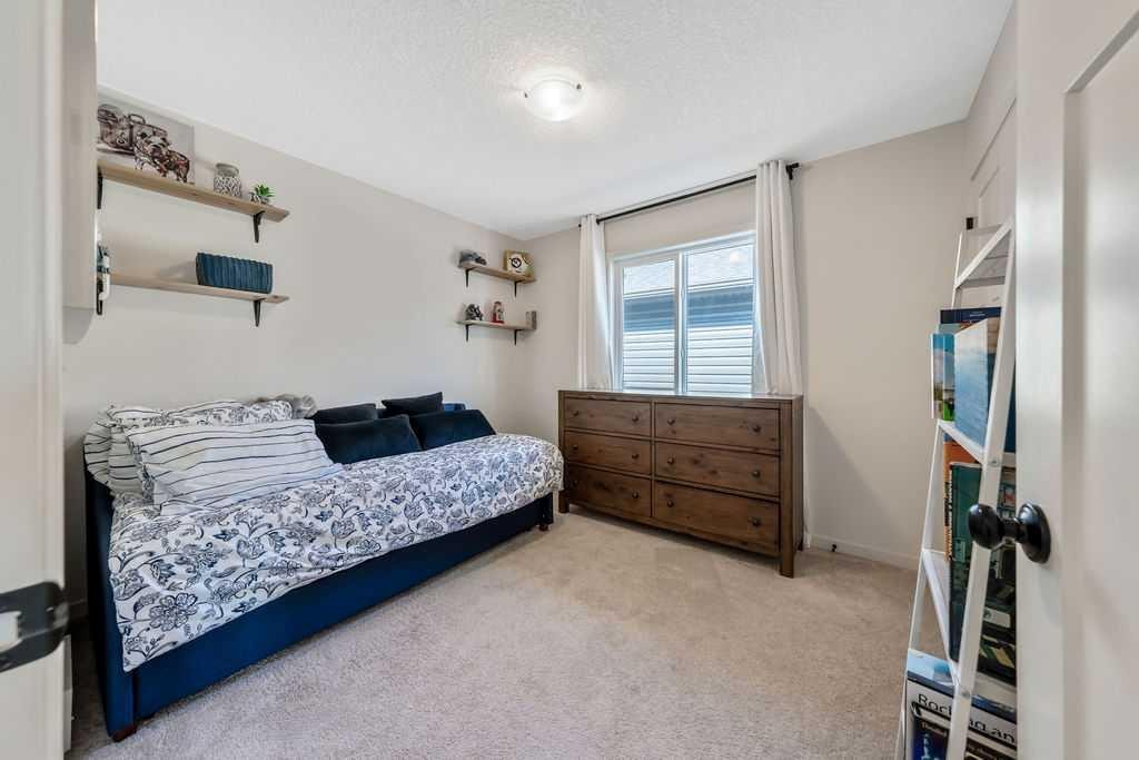 114 Seton Grove Se, Calgary, AB - Indoor Photo Showing Bedroom