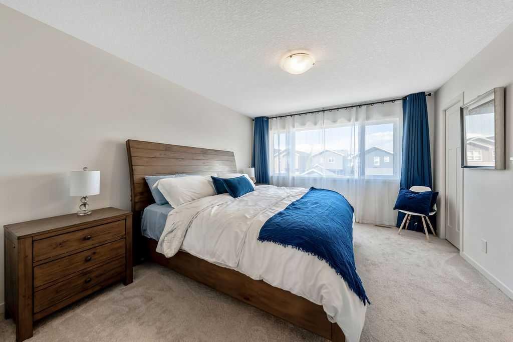 114 Seton Grove Se, Calgary, AB - Indoor Photo Showing Bedroom