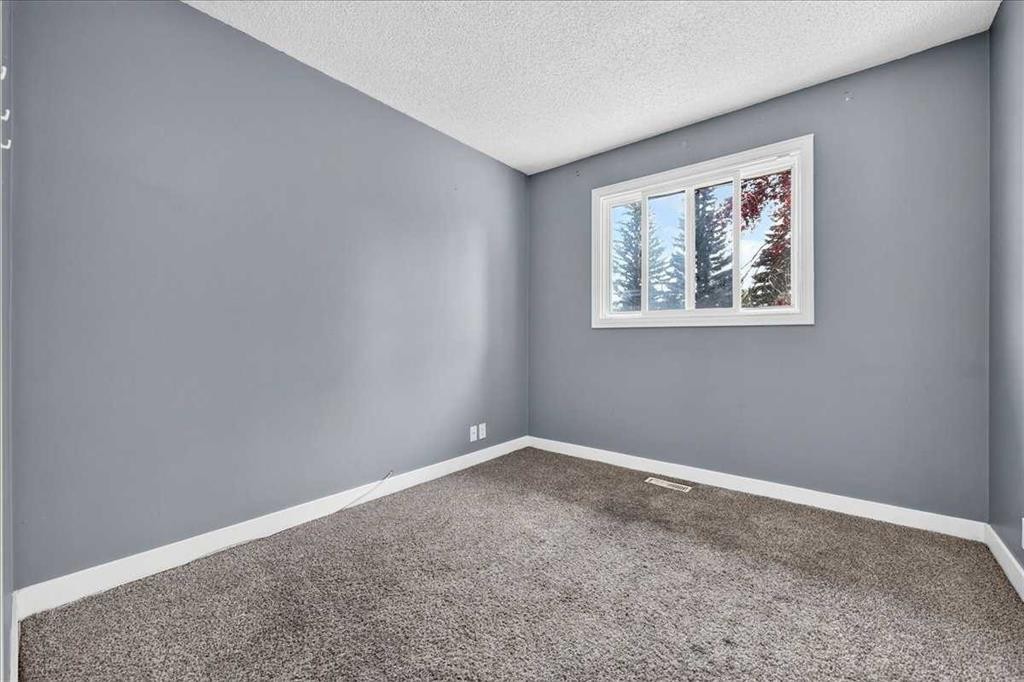 136 Templeview Place Ne, Calgary, AB - Indoor Photo Showing Other Room