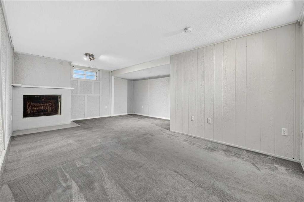 136 Templeview Place Ne, Calgary, AB - Indoor With Fireplace