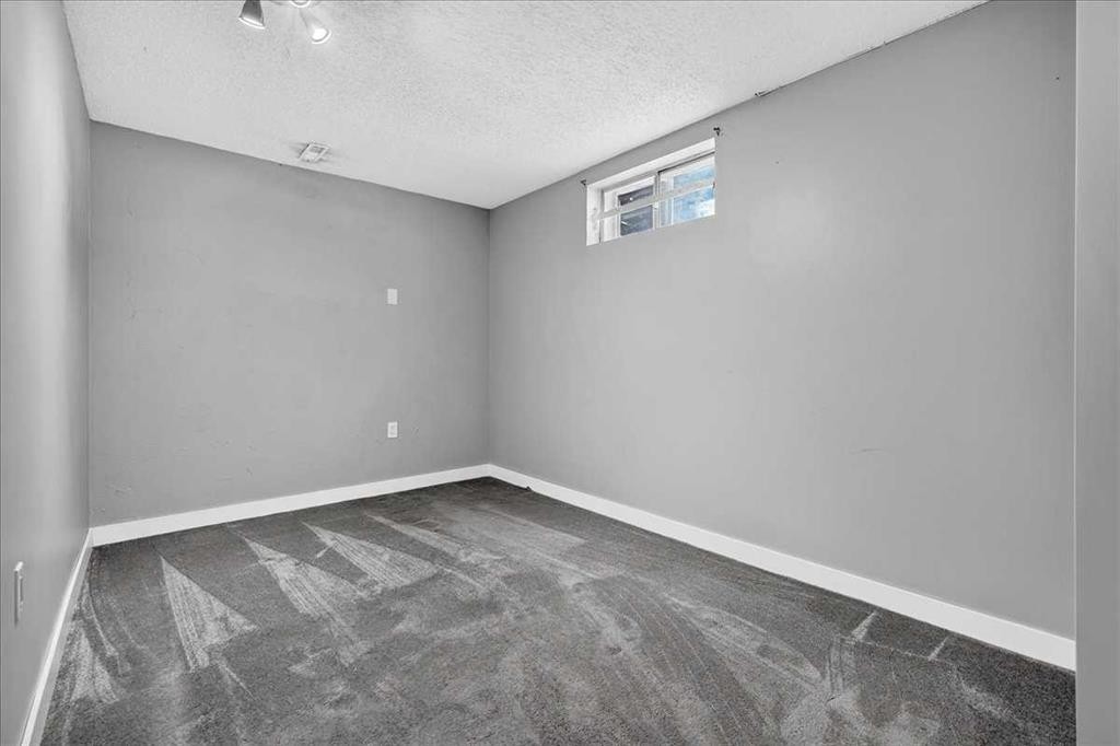 136 Templeview Place Ne, Calgary, AB - Indoor Photo Showing Other Room