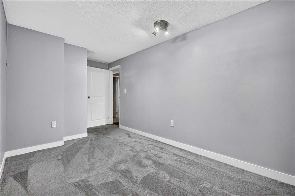136 Templeview Place Ne, Calgary, AB - Indoor Photo Showing Other Room