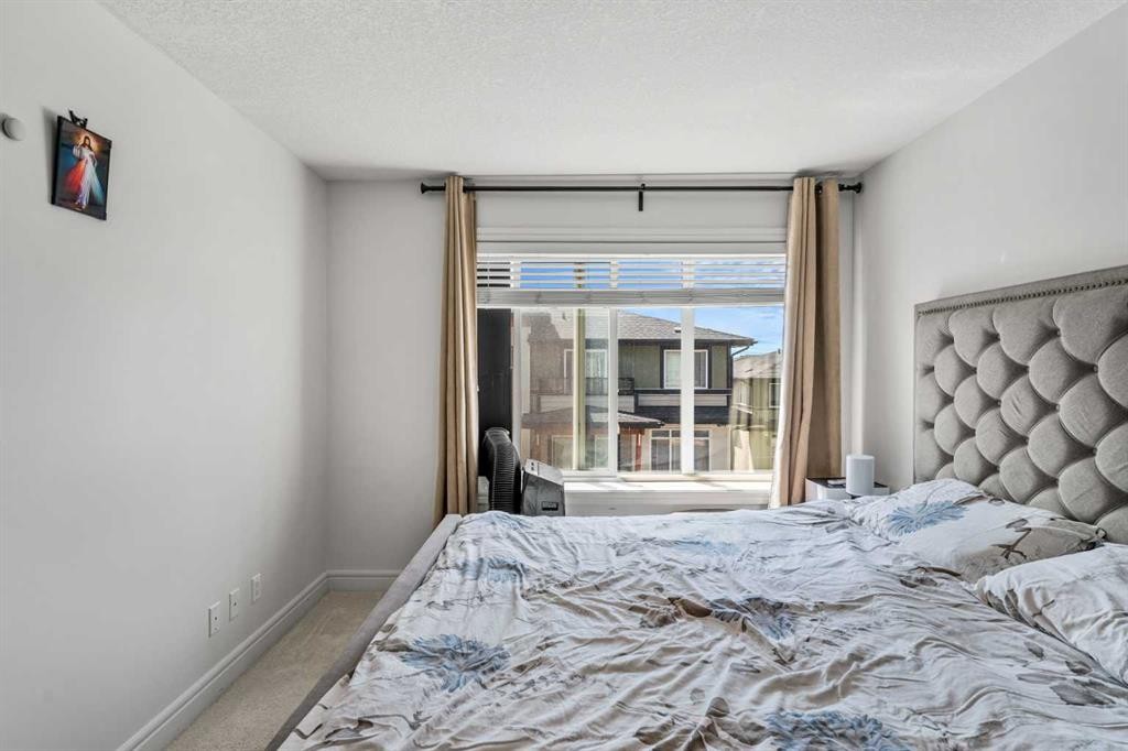 4367 Seton Drive Se, Calgary, AB - Indoor Photo Showing Bedroom
