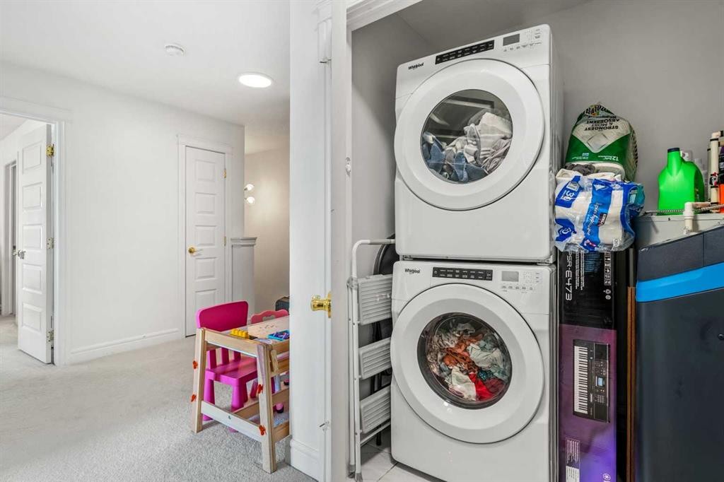 4367 Seton Drive Se, Calgary, AB - Indoor Photo Showing Laundry Room