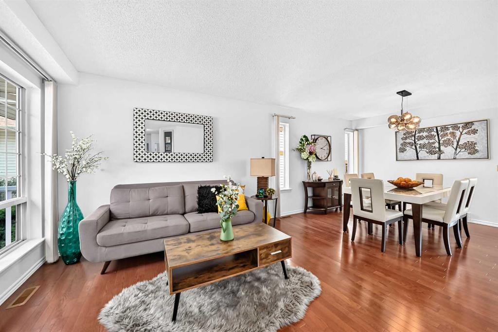 144 Riverstone Crescent Se, Calgary, AB - Indoor Photo Showing Living Room