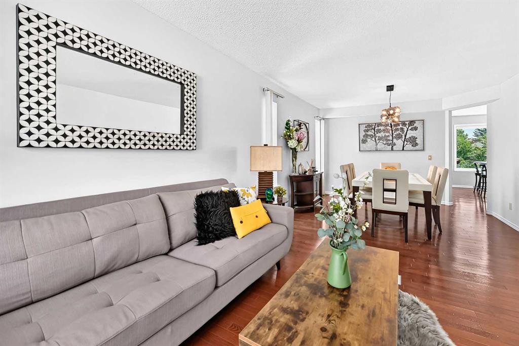 144 Riverstone Crescent Se, Calgary, AB - Indoor Photo Showing Living Room