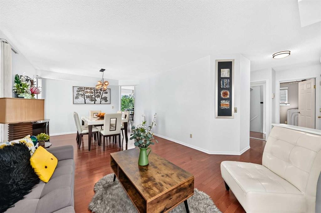 144 Riverstone Crescent Se, Calgary, AB - Indoor Photo Showing Living Room