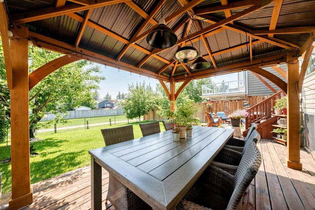 144 Riverstone Crescent Se, Calgary, AB - Outdoor With Deck Patio Veranda With Exterior