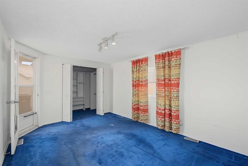 145 Spring Haven Mews Se, Airdrie, AB - Indoor Photo Showing Other Room