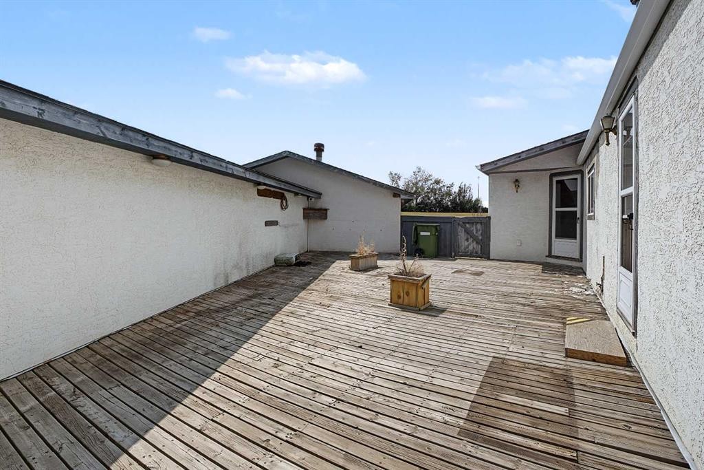 145 Spring Haven Mews Se, Airdrie, AB - Outdoor With Deck Patio Veranda With Exterior