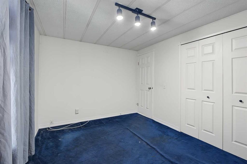 145 Spring Haven Mews Se, Airdrie, AB - Indoor Photo Showing Other Room