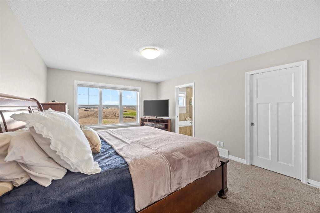 27 Mahogany Crescent Se, Calgary, AB - Indoor Photo Showing Bedroom