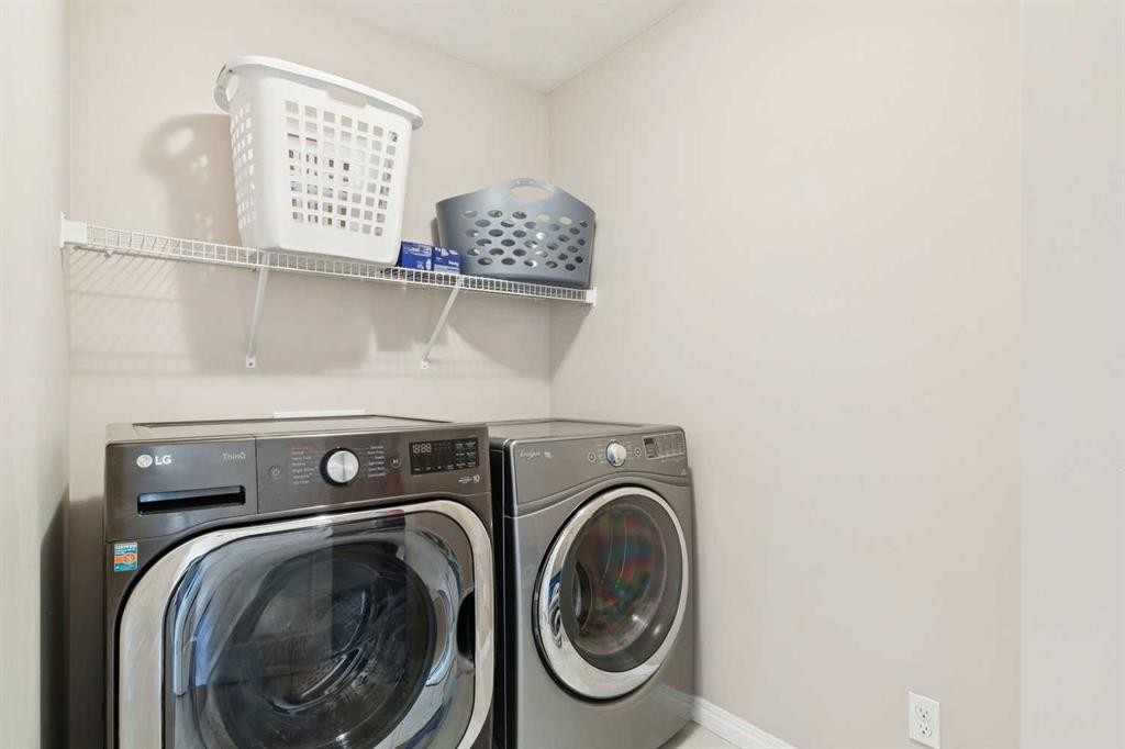 92 Cougar Ridge Close Sw, Calgary, AB - Indoor Photo Showing Laundry Room