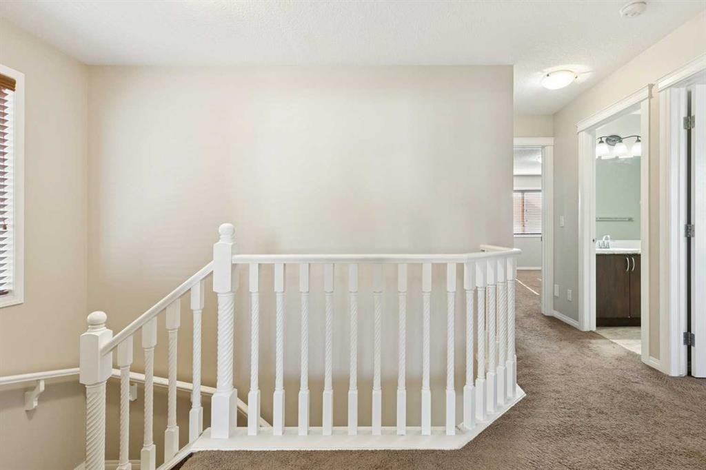 92 Cougar Ridge Close Sw, Calgary, AB - Indoor Photo Showing Other Room