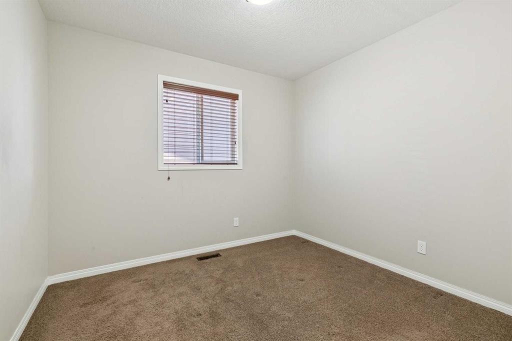 92 Cougar Ridge Close Sw, Calgary, AB - Indoor Photo Showing Other Room