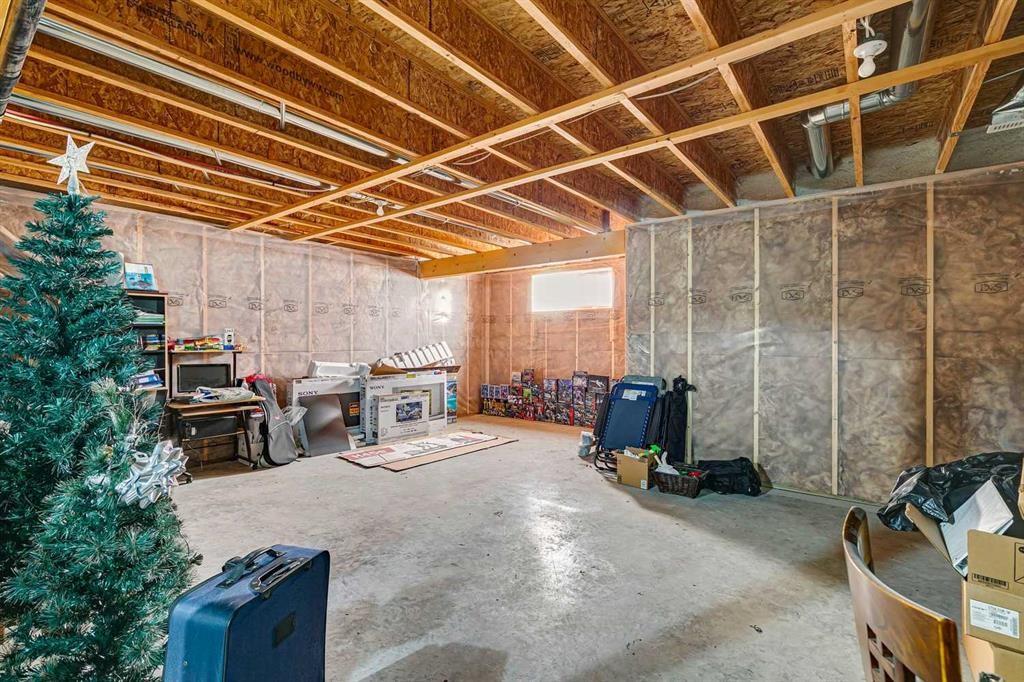 92 Cougar Ridge Close Sw, Calgary, AB - Indoor Photo Showing Basement