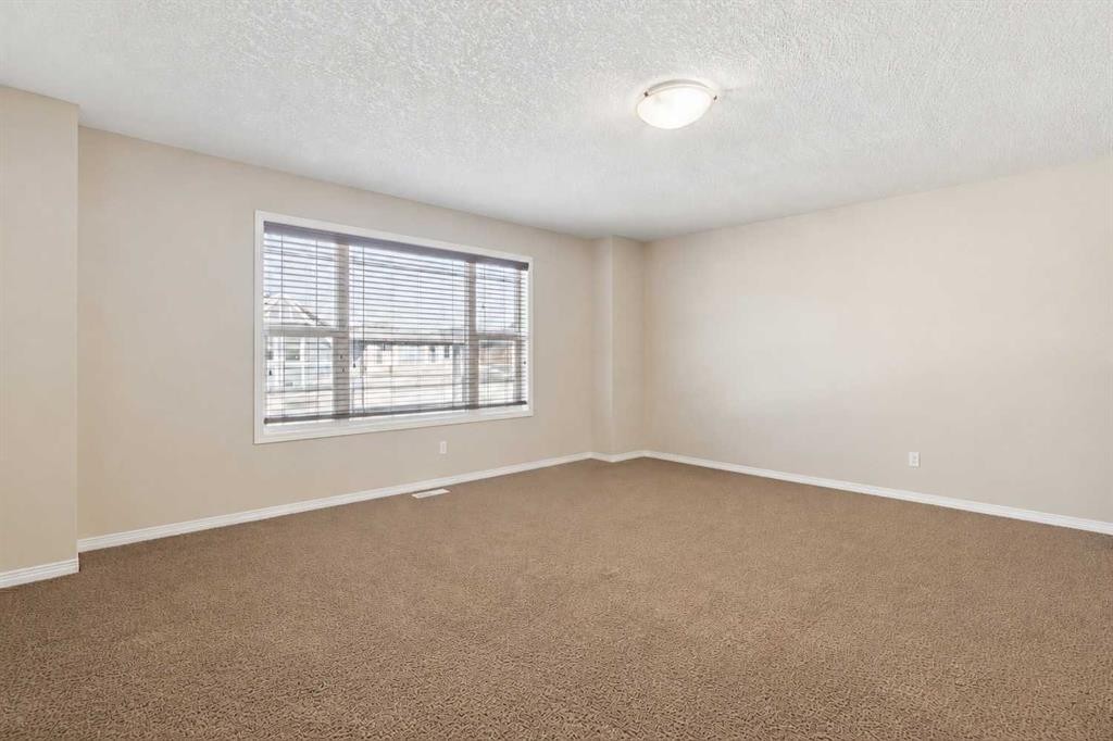 92 Cougar Ridge Close Sw, Calgary, AB - Indoor With Fireplace