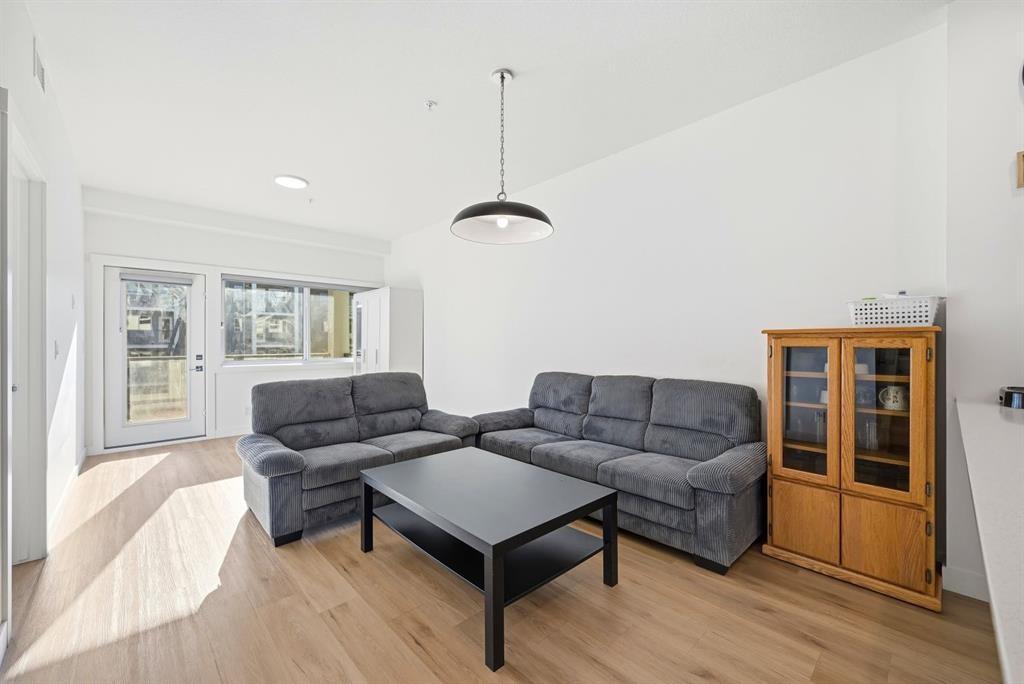 2216-151 Skyview Bay Ne, Calgary, AB - Indoor Photo Showing Living Room