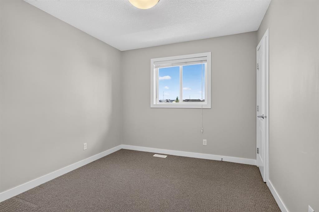 22 Panora Road Nw, Calgary, AB - Indoor Photo Showing Other Room