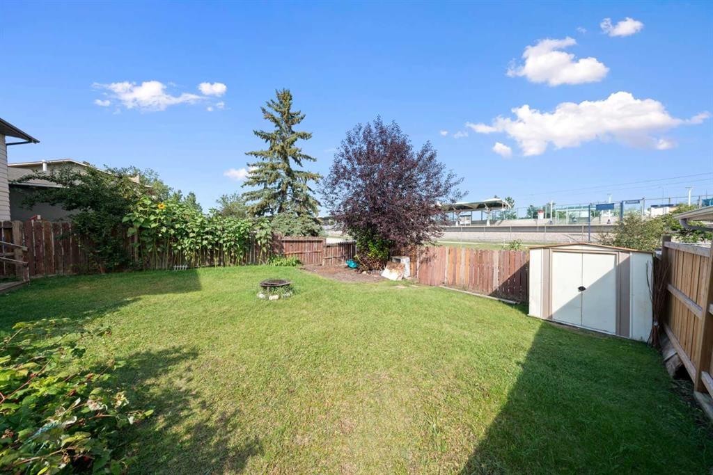 32 Shawmeadows Road Sw, Calgary, AB - Outdoor With Backyard