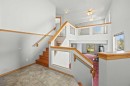 117 Hidden Spring Circle Nw, Calgary, AB  - Indoor Photo Showing Other Room 