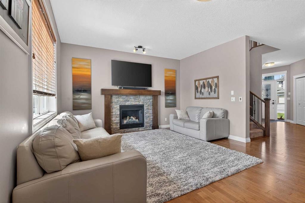 159 Sherwood Crescent Nw, Calgary, AB - Indoor Photo Showing Living Room With Fireplace