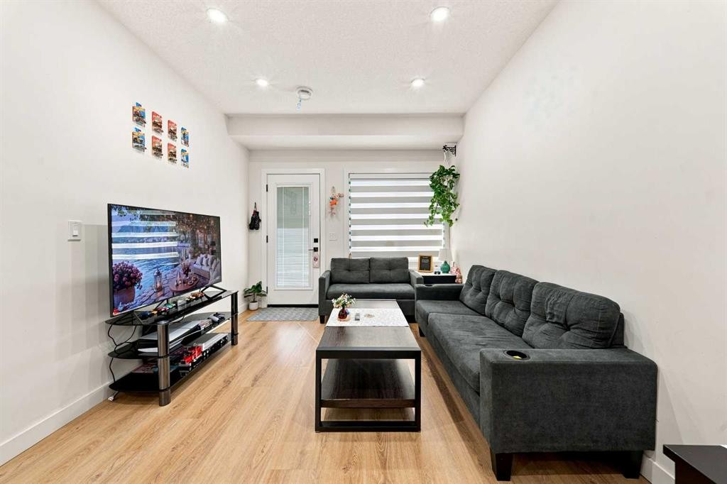 303 Cornerbrook Drive Ne, Calgary, AB - Indoor Photo Showing Living Room