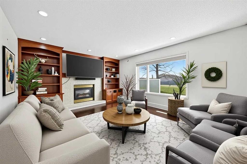 98 Hampstead Circle Nw, Calgary, AB - Indoor Photo Showing Living Room With Fireplace