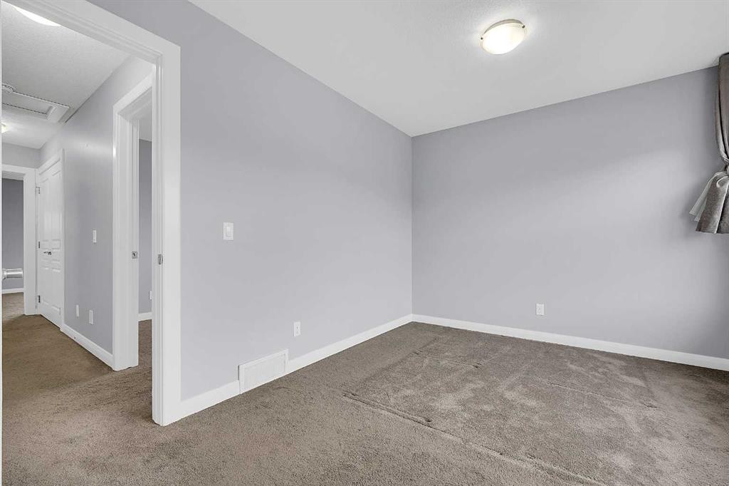 95 Redstone Park Ne, Calgary, AB - Indoor Photo Showing Other Room