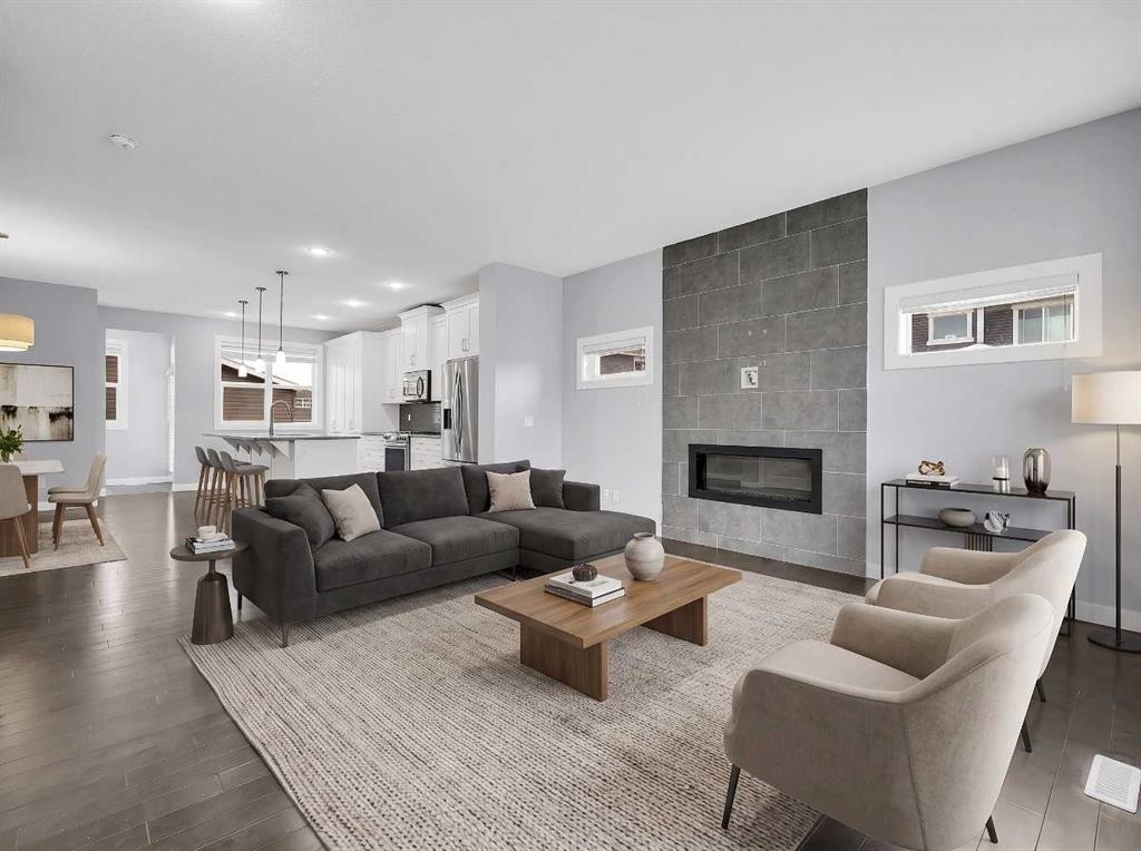 95 Redstone Park Ne, Calgary, AB - Indoor Photo Showing Living Room With Fireplace