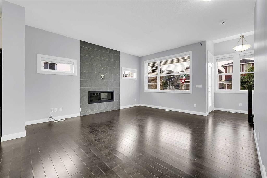 95 Redstone Park Ne, Calgary, AB - Indoor Photo Showing Living Room With Fireplace