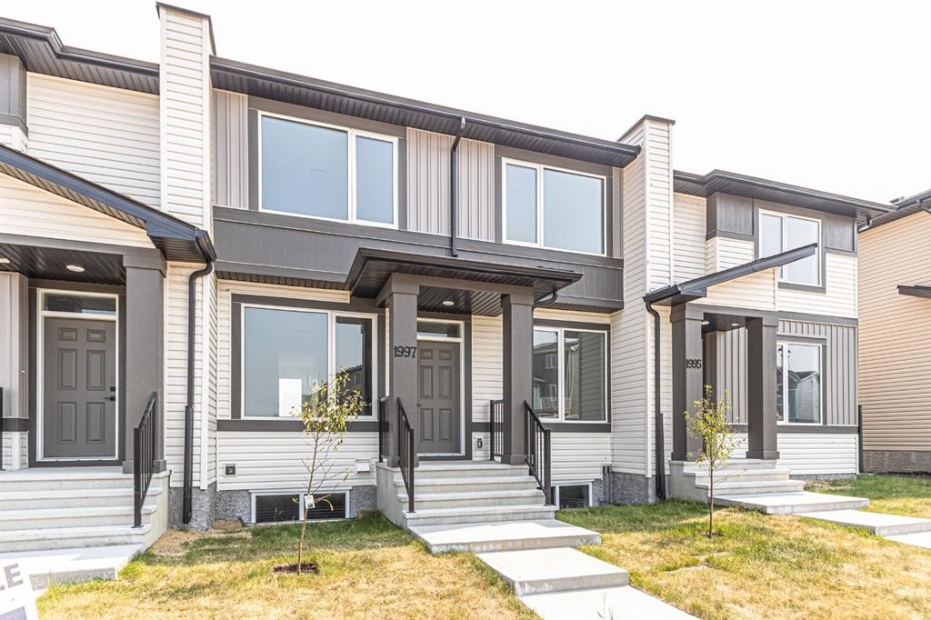 1997 Mccaskill Drive, Crossfield, AB - Outdoor With Facade