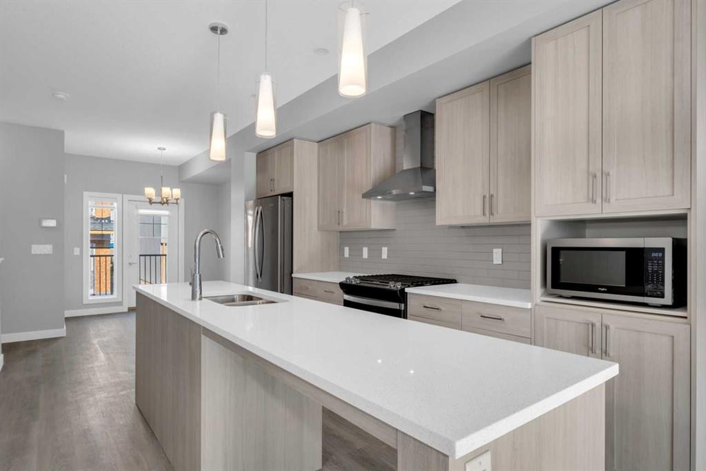 924 Sage Hill Grove Nw, Calgary, AB - Indoor Photo Showing Kitchen With Stainless Steel Kitchen With Double Sink With Upgraded Kitchen