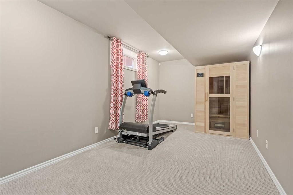 52 Copperfield Close Se, Calgary, AB - Indoor Photo Showing Gym Room