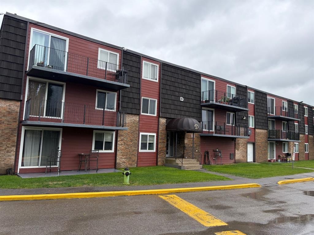 14D-80 Galbraith Drive Sw, Calgary, AB - Outdoor With Balcony With Facade