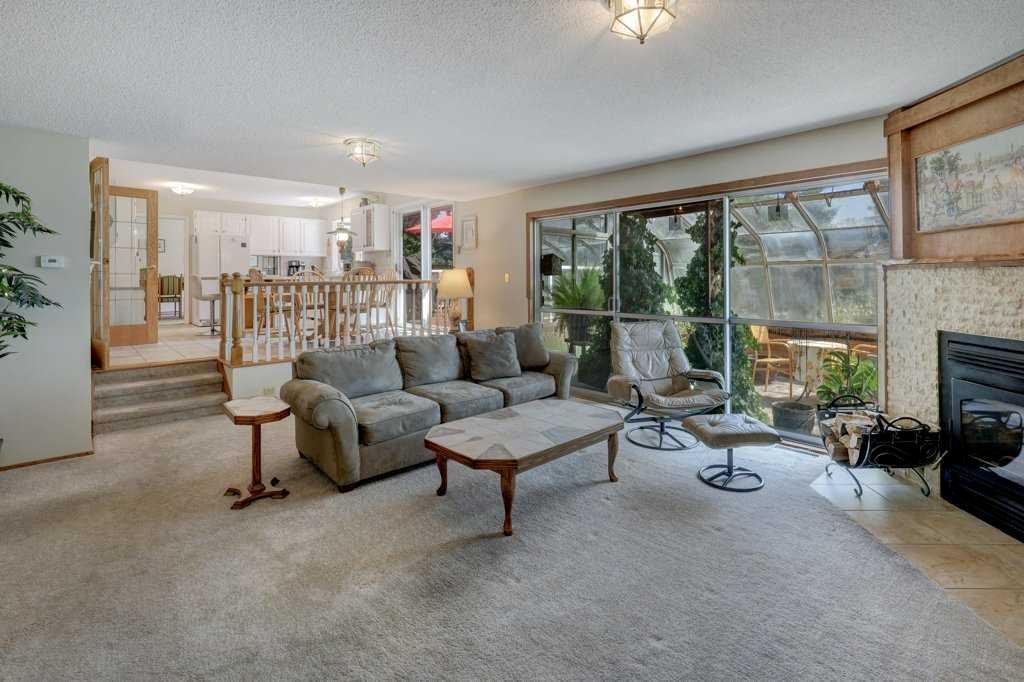 223 Willow Ridge Place Se, Calgary, AB - Indoor Photo Showing Living Room With Fireplace