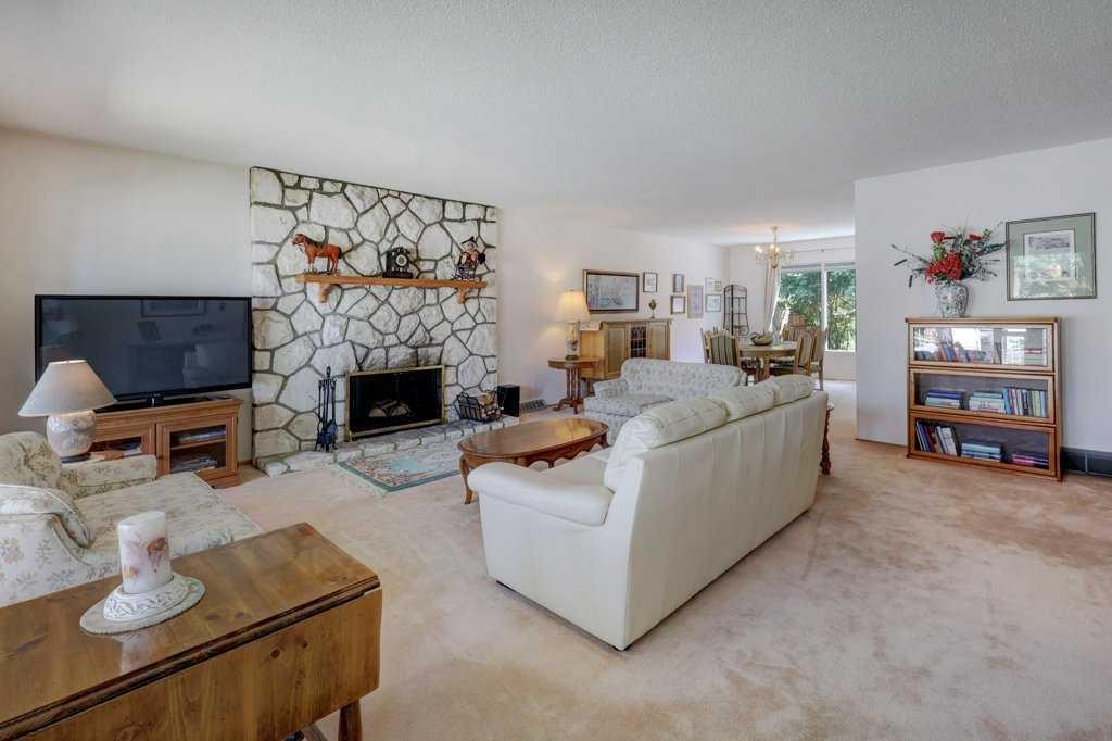 223 Willow Ridge Place Se, Calgary, AB - Indoor Photo Showing Living Room With Fireplace