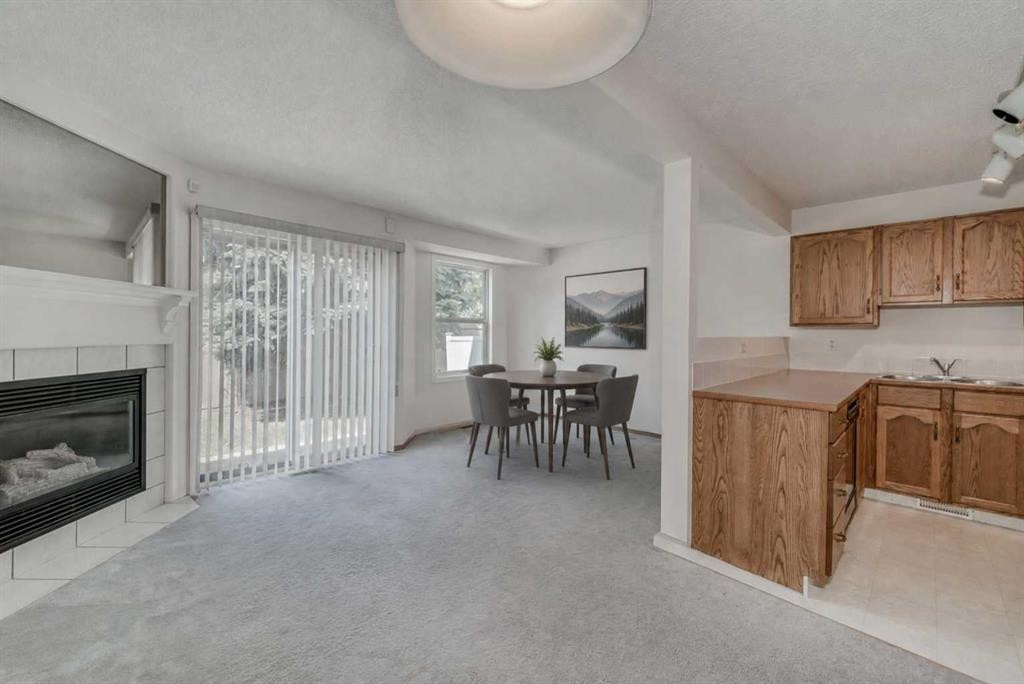 15 Harvest Glen Heights Ne, Calgary, AB - Indoor With Fireplace