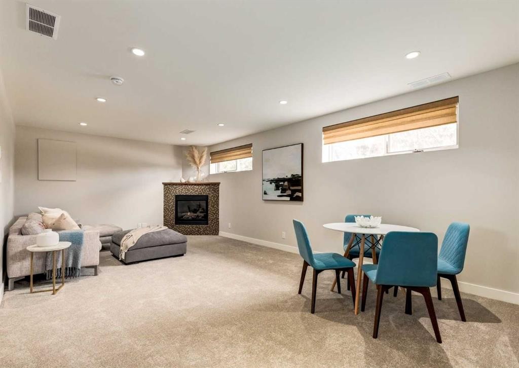 176 Mapleburn Drive Se, Calgary, AB - Indoor With Fireplace