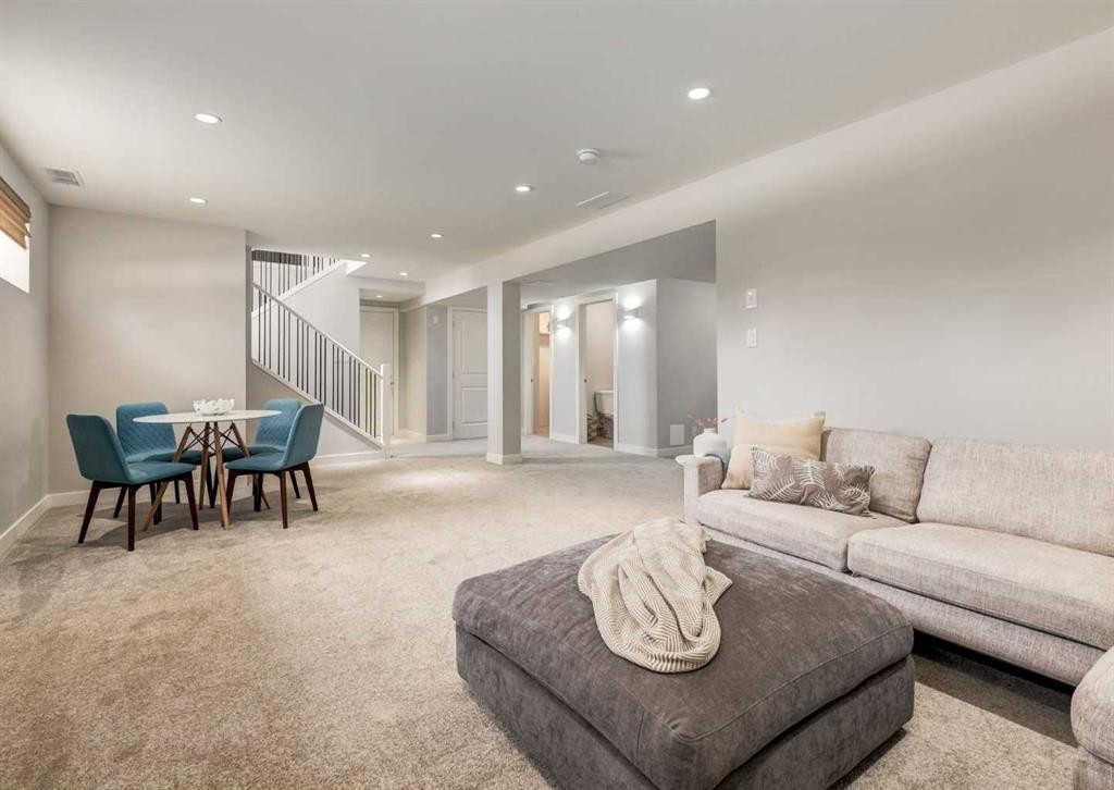 176 Mapleburn Drive Se, Calgary, AB - Indoor Photo Showing Living Room